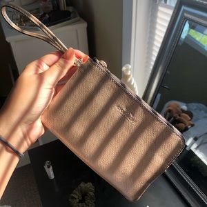 Coach rose gold wristlet